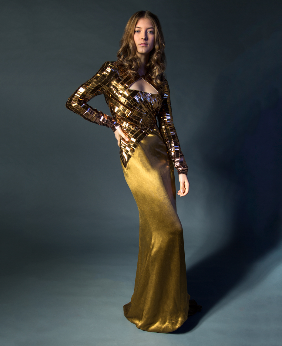 Woman in gold dress fashion photography